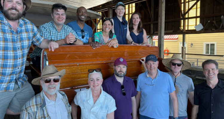 The team posed on the back of a boat in the dock. Top: L-R: Dr. Kevin O'Malley, Dr. Lewis E. Johnson, Dr. Delwin L. Elder, Maryse, Erica McGillivray, Dr. Stephanie Benight Bottom L-R: Dr. Bruce H. Robinson, Pamela, Dr. Scott R. Hammond, Gerard Zytnicki, Rob Dunn, and David Sparks