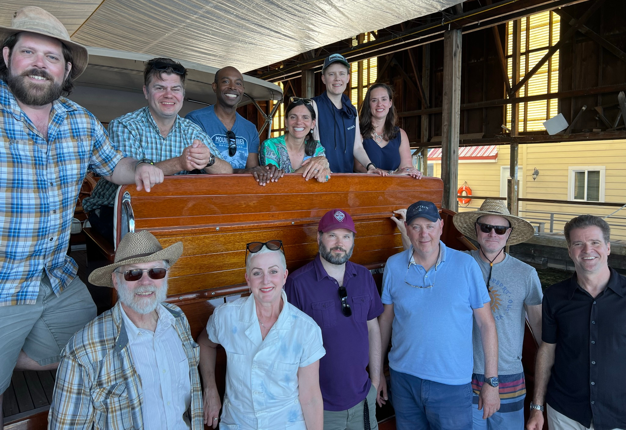 The team posed on the back of a boat in the dock. Top: L-R: Dr. Kevin O'Malley, Dr. Lewis E. Johnson, Dr. Delwin L. Elder, Maryse, Erica McGillivray, Dr. Stephanie Benight Bottom L-R: Dr. Bruce H. Robinson, Pamela, Dr. Scott R. Hammond, Gerard Zytnicki, Rob Dunn, and David Sparks