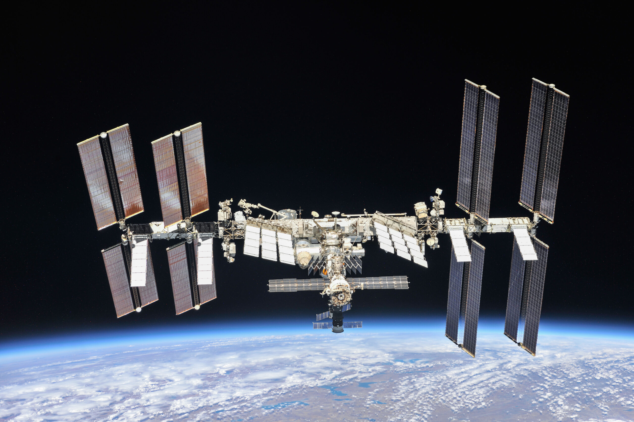 The International Space Station photographed by Expedition 56 crew members from a Soyuz spacecraft after undocking. NASA astronauts Andrew Feustel and Ricky Arnold and Roscosmos cosmonaut Oleg Artemyev executed a fly around of the orbiting laboratory to take pictures of the station before returning home after spending 197 days in space. The station will celebrate the 20th anniversary of the launch of the first element Zarya in November 2018.