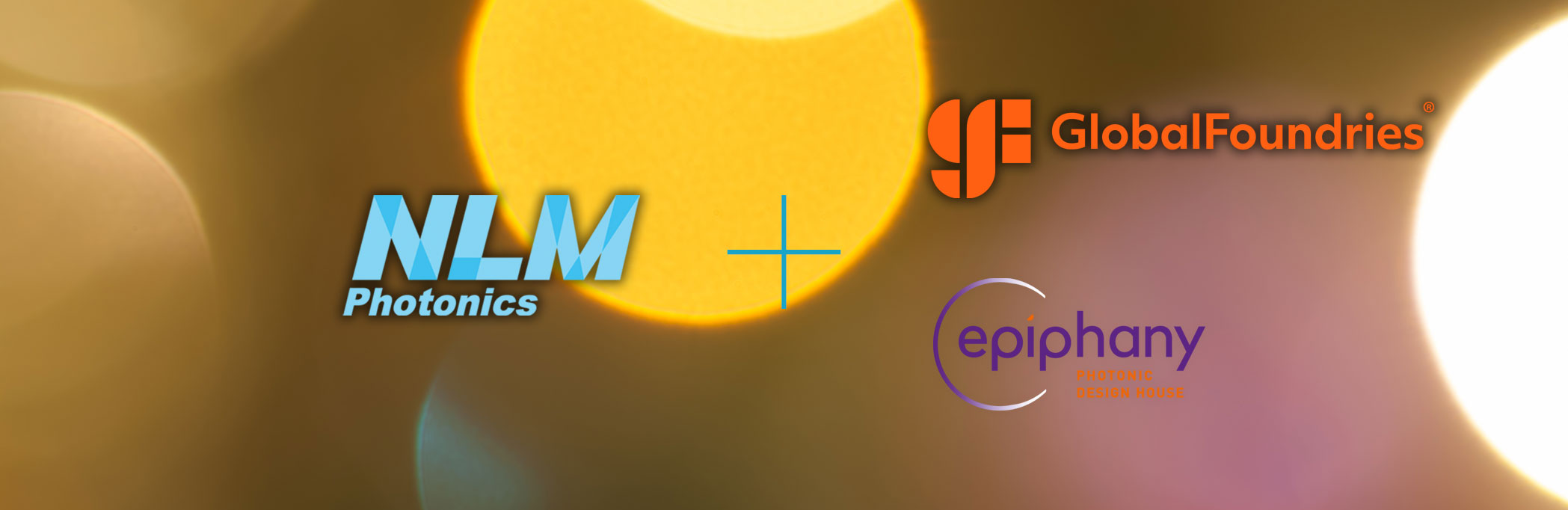 Background image is shining light that's yellow and orange. Features NLM's, GlobalFoundries', and Epiphany's logos